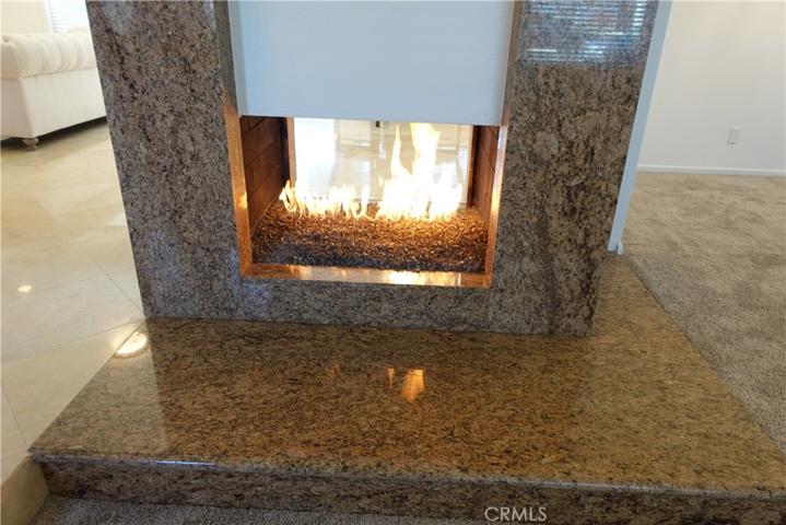 Closer View of Granite Fireplace