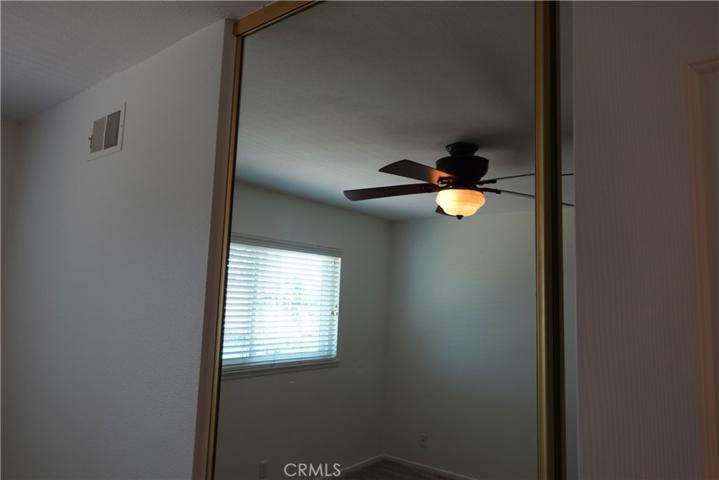 Mirror Closet Doors & Ceiling Fans in Bedrooms