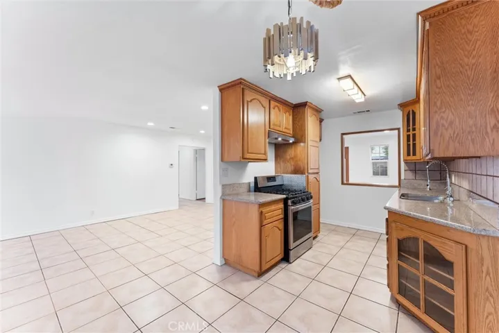 View from Dining area to kitchen and open to family room area