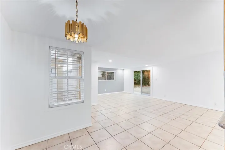 1349 sf home with generous family, dining area(s), convenient access to driveway/garage and directly to patio & backyard