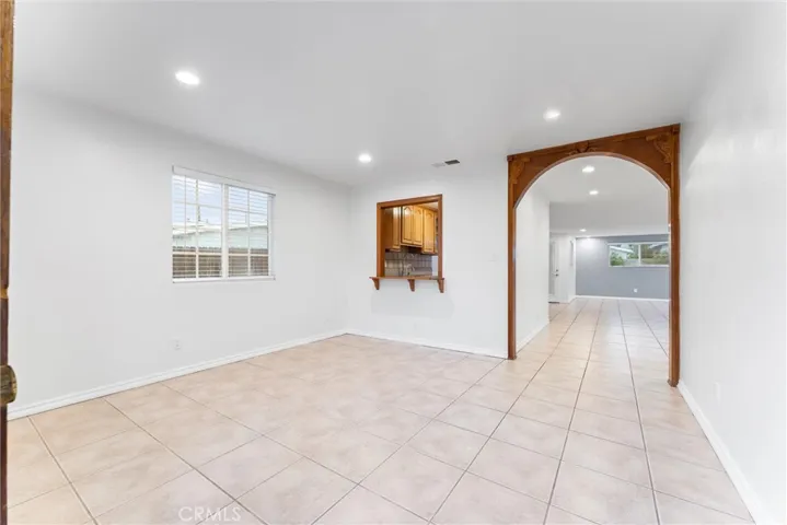 Expansive open floor plan, custom archway