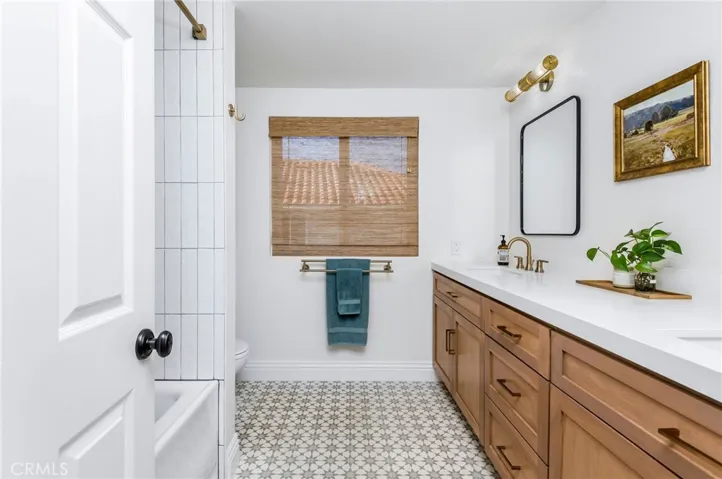 beautifully updated hall bathroom - 2 sinks, lots of counter and cabinet space