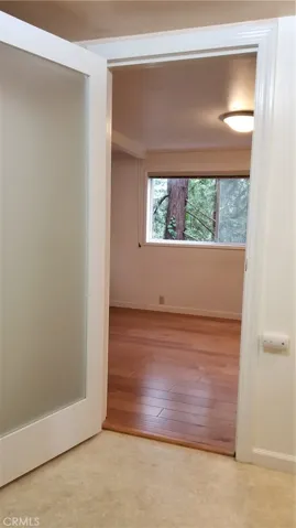 Looking into bedroom from bathroom.