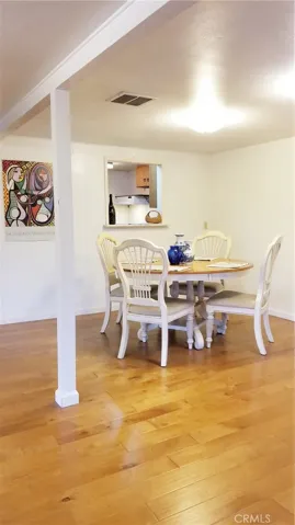 Pass through window into kitchen. Good lighting.
