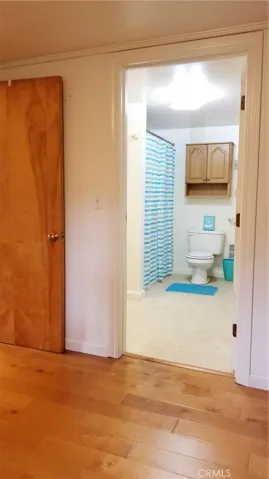 From bedroom into bathroom.