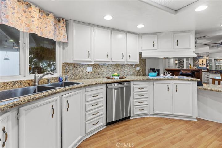 Kitchen looking out to great room living area