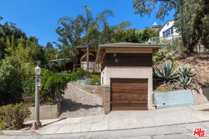 Street Entry-Gated Driveway & Garage