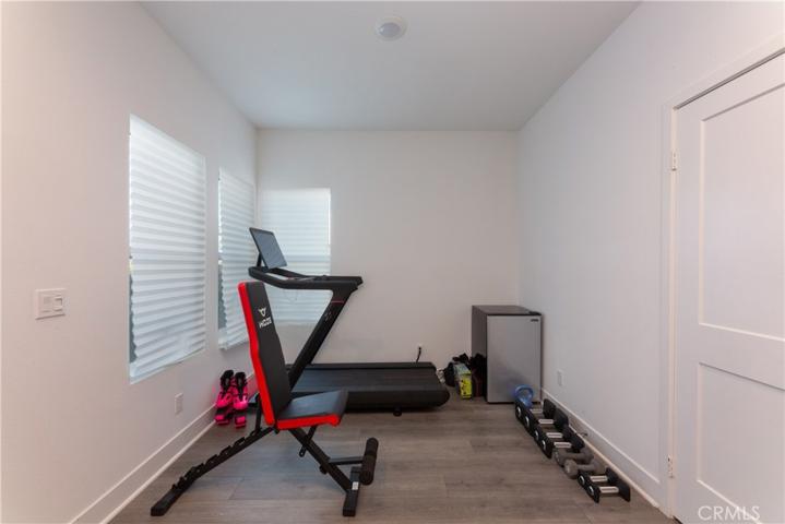 main floor home office or home gym. Has closet and restroom first level