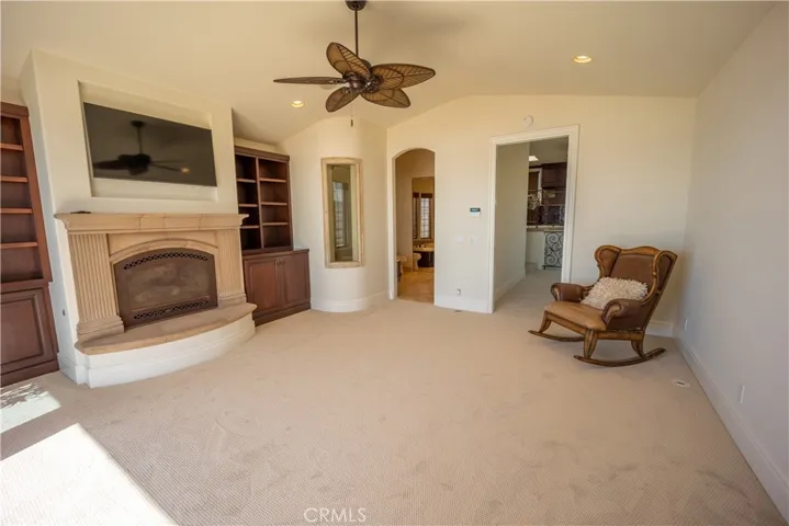 primary bedroom with large sliders and deck over ocean