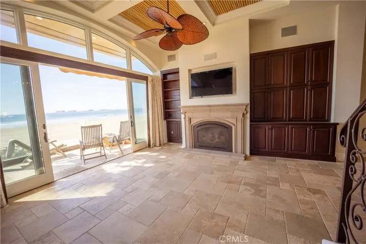main living with fireplace and large deck