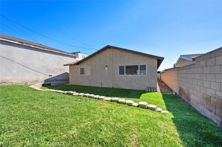 The backyard with plenty of space for your next family gathering