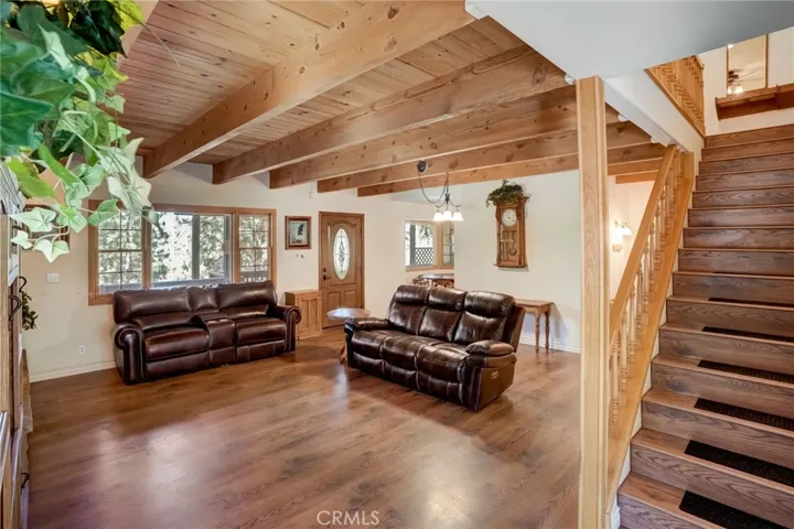 Living room showing stairs to the bedrooms