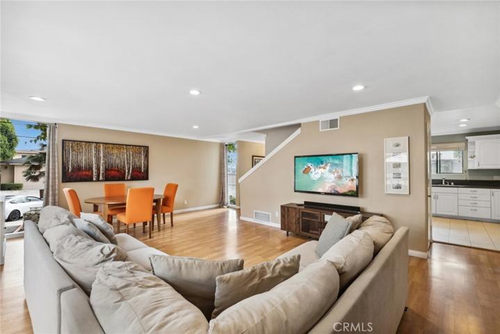 Living room, dining area and kitchen