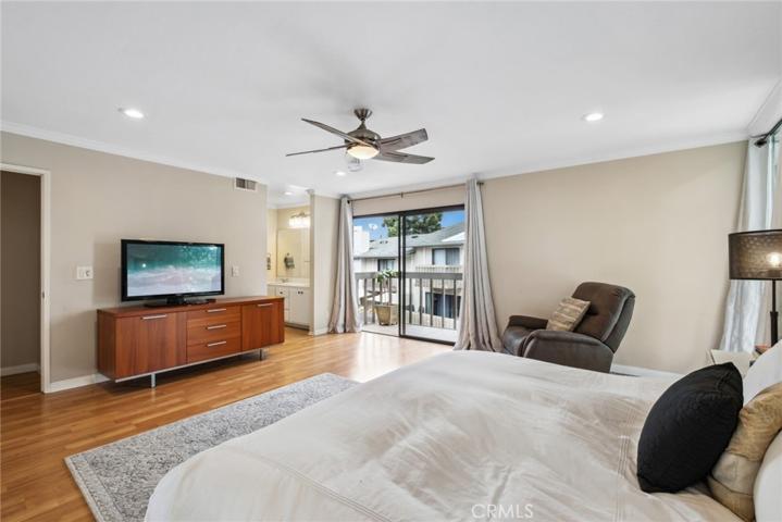 Master suite with a balcony