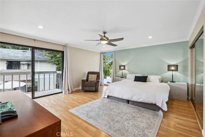 Master suite with a balcony