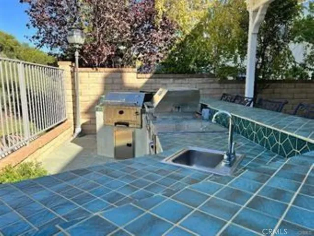 Two built in BBQ's with lots of counter space