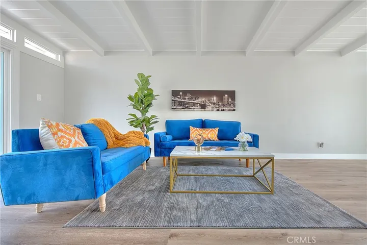 Family Room w/New Laminate waterproof flooring and New Energy Efficient Sliding Glass Doors.