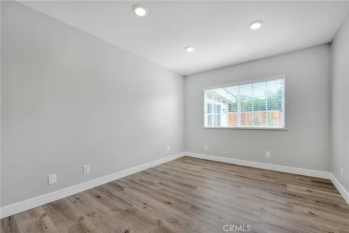 Bedroom 3 w/Recessed Lights, New Laminate Waterproof Flooring, and Blinds.