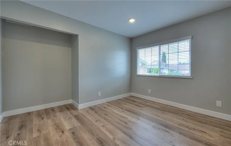 Office Room Possible Bedroom 4 w/Recessed lights, New Laminate waterproof flooring and Blinds.