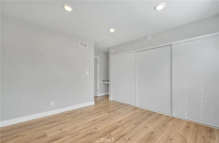 Primary Bedroom 1 w/Recessed lights, Laminate Waterproof flooring, Blinds.
VERY Spacious Closet.