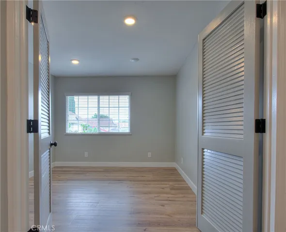 Office Room Possible Bedroom 4 w/Recessed lights, New Laminate waterproof flooring and Blinds.