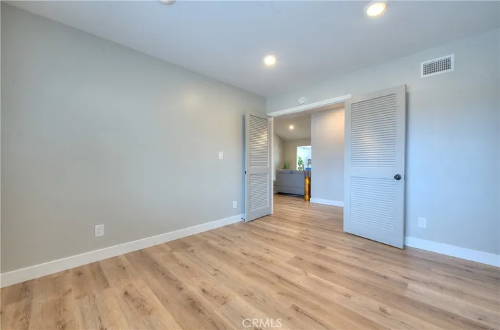 Office Room Possible Bedroom 4 w/Recessed lights, New Laminate waterproof flooring and Blinds.