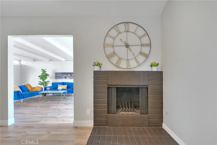 Living Room w/Fireplace. New Laminate waterproof flooring throughout the home.
Adjacent to the family Room.