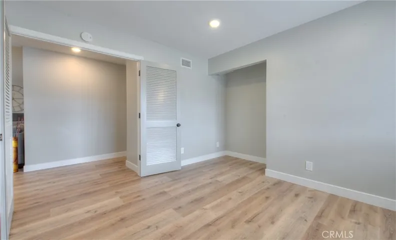 Office Room Possible Bedroom 4 w/Recessed lights, New Laminate waterproof flooring and Blinds.