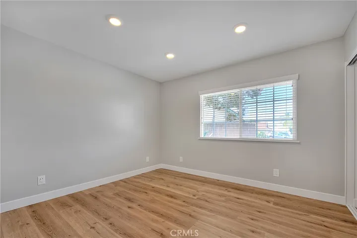 Bedroom 2 w/Recessed Lights, New Laminate Waterproof Flooring, and Blinds.