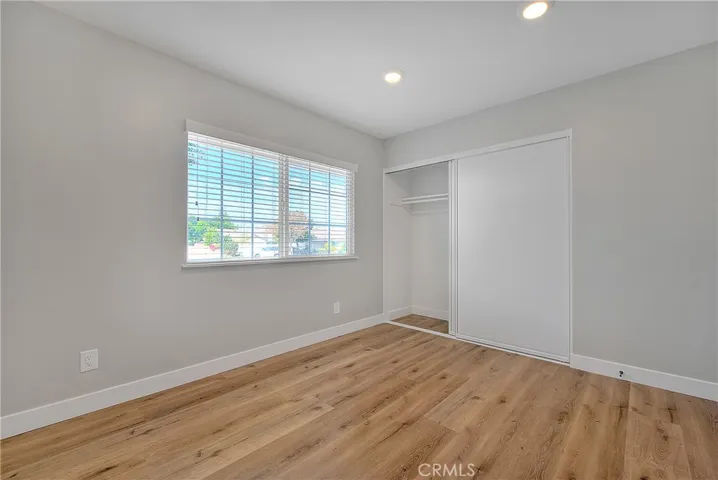 Bedroom 2 w/Recessed Lights, New Laminate Waterproof Flooring, and Blinds.

