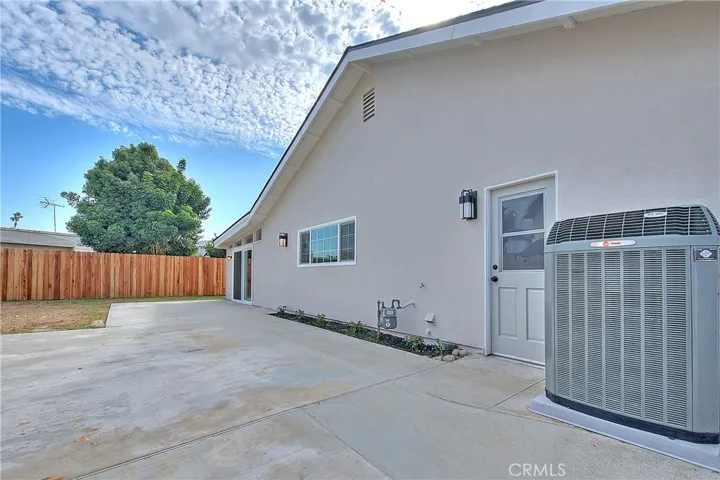 Backyard Side w/garage Access.