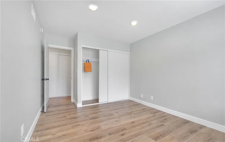 Bedroom 3 w/Recessed Lights, New Laminate Waterproof Flooring, and Blinds.