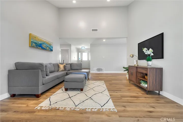 Living w/New Laminate waterproof flooring throughout the home.