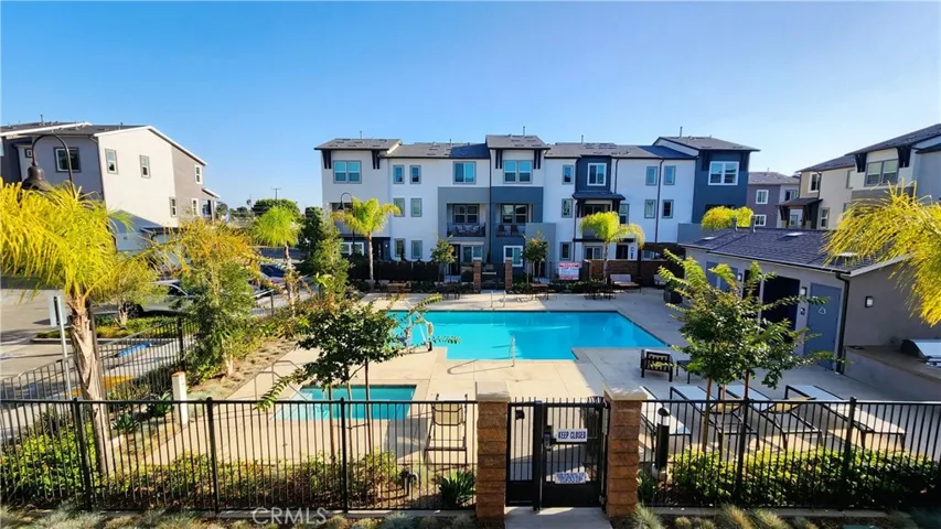 View of Pool & BBQ Area from Balcony