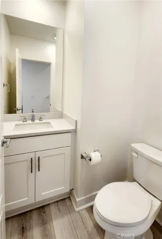 Half Bath Downstairs next to the Den
