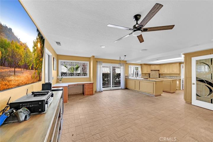 Large Family room with built in desk and dining area