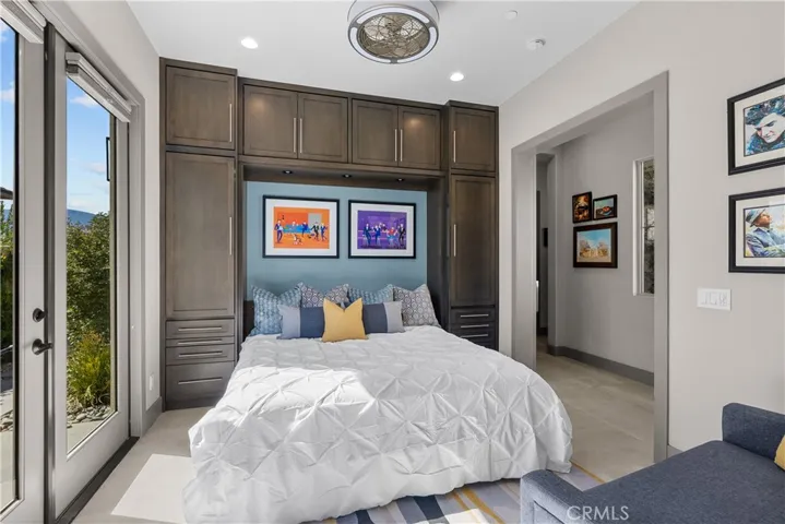 Flex room comes with a murphy bed that allows you to lower with the desk in place!