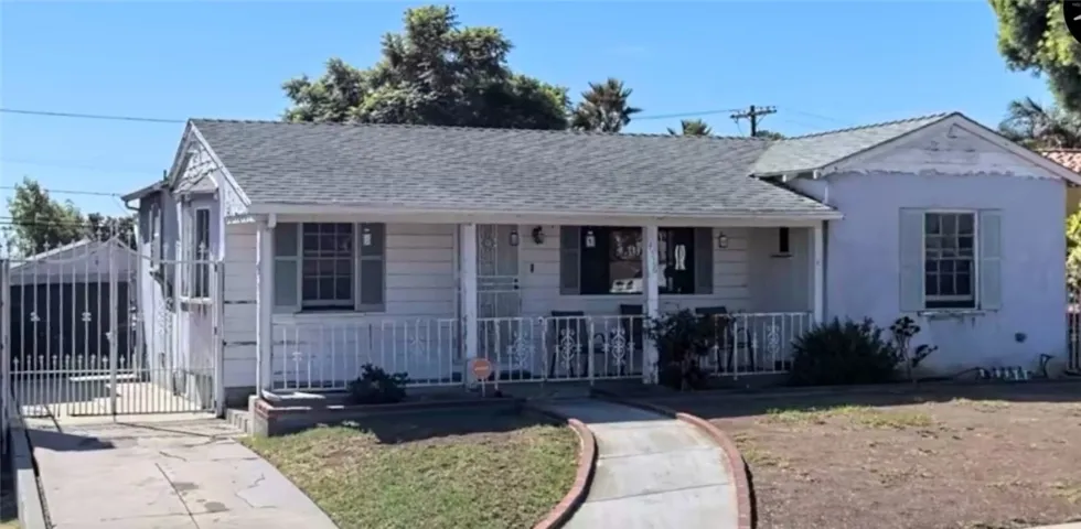Covered Porch, Pull Through Access to Garage.