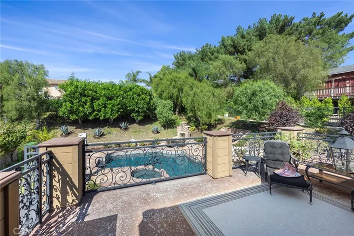 This is a wonderful view of the pool looking out from the deck. You can see Disneyland Fireworks from the deck. Wide open views of the yard from up on the deck.
