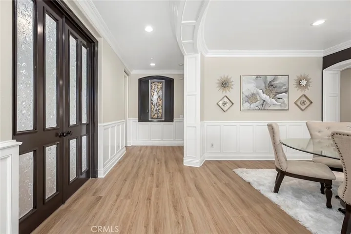 French doors open to a bedroom with ensuite