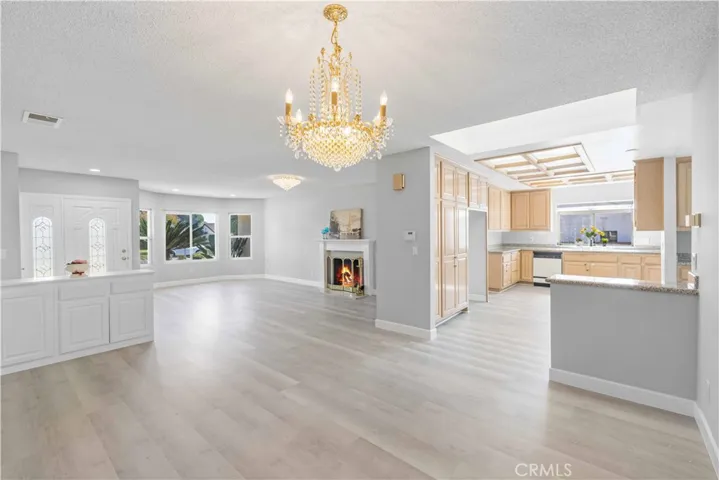 View from Dining area to the Living room and kitchen
