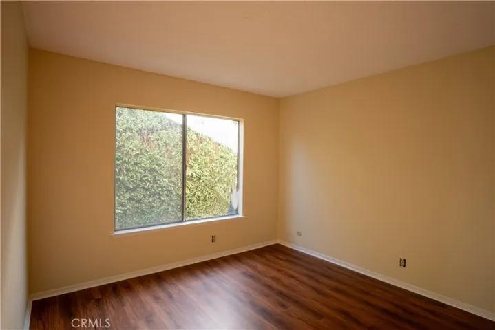 Bedroom with side yard view