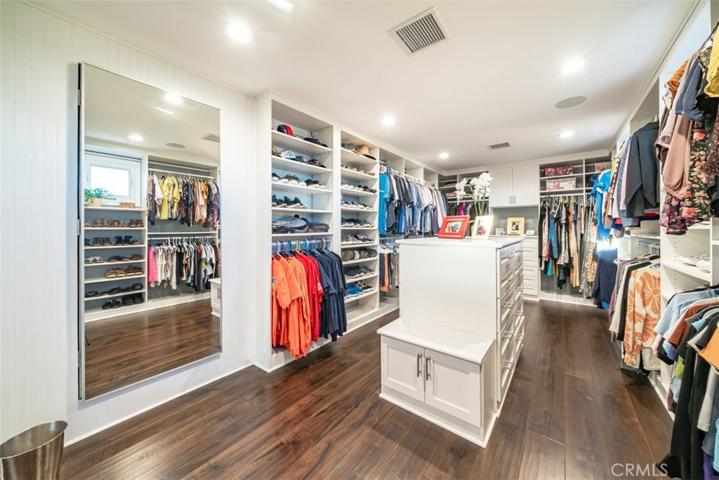 Primary Custom California Closet with island