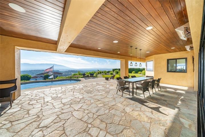 Patio featuring custom millwork ceilings and inset lighting