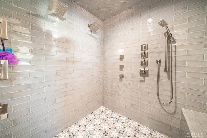 Shower has 2 heads and body sprays