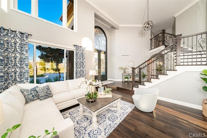 View from formal Living Room to Entry and staircase