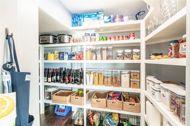 Barn door Pantry wraps around to wine storage also!