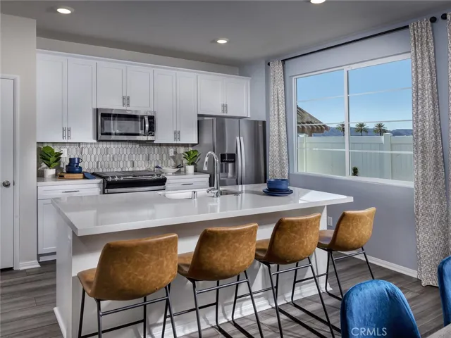 Photo is not of the actual home, but is an inspirational photo of builder’s model home and may depict options, furnishings, and/or decorator features that are not included