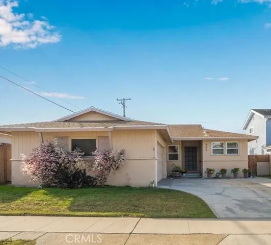 Beach cottage on an over-sized lot just waiting for your touch.