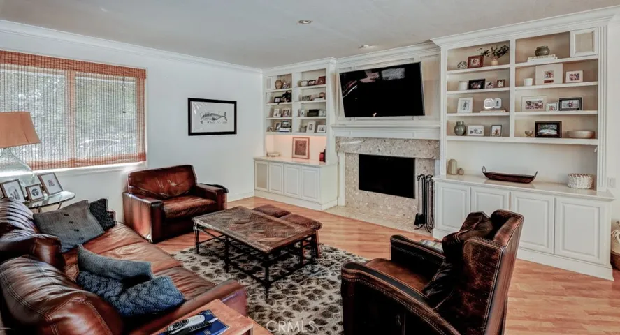 Large open living room with built-ins.